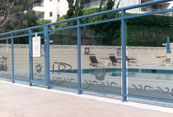 swimming pool with glass railing