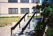 stairway with an aluminum handrail